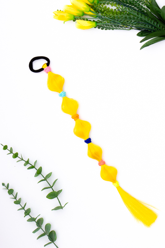 Коси зі штучного волосся на гумках